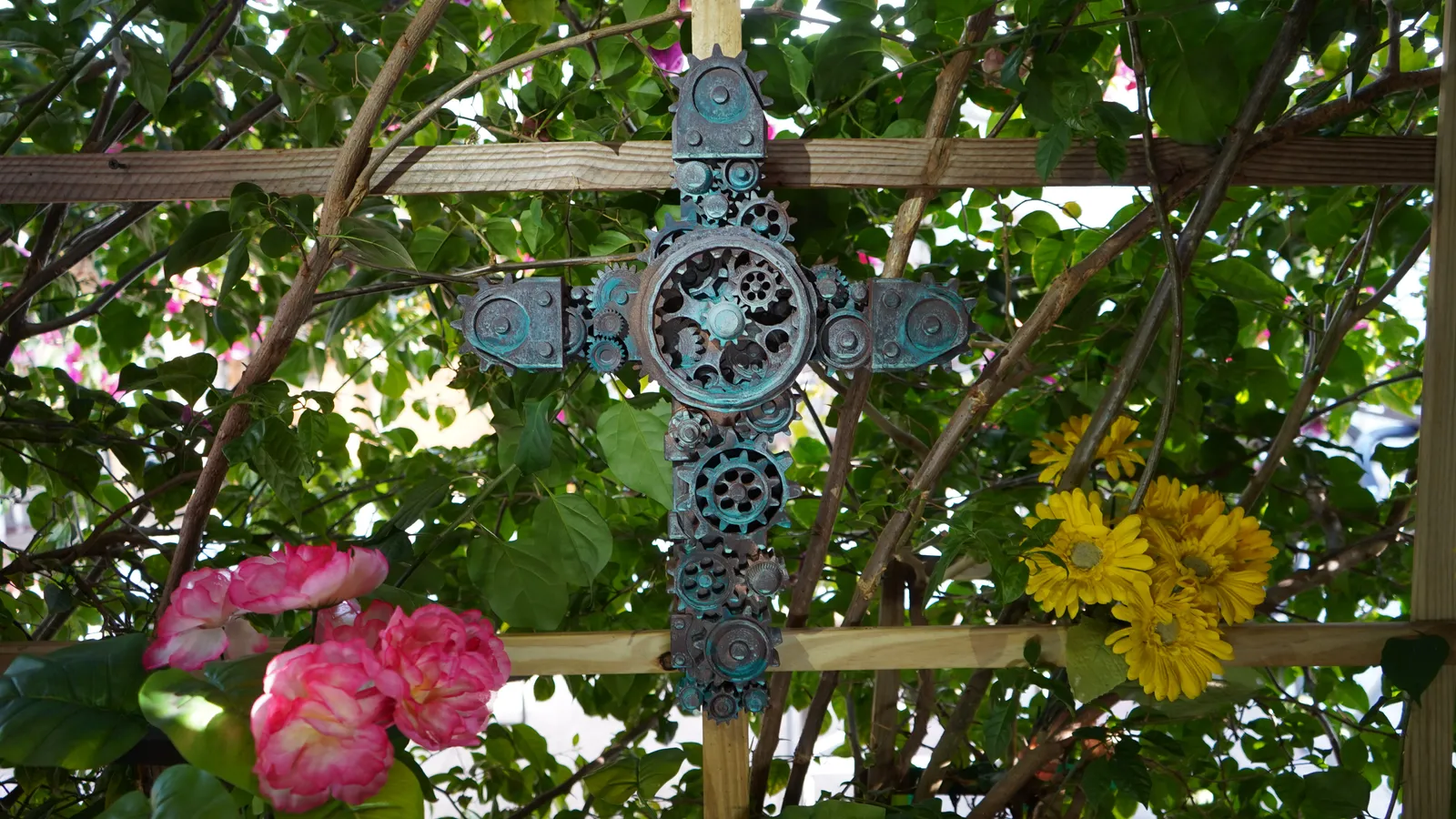 Turquoise patina gear cross detail