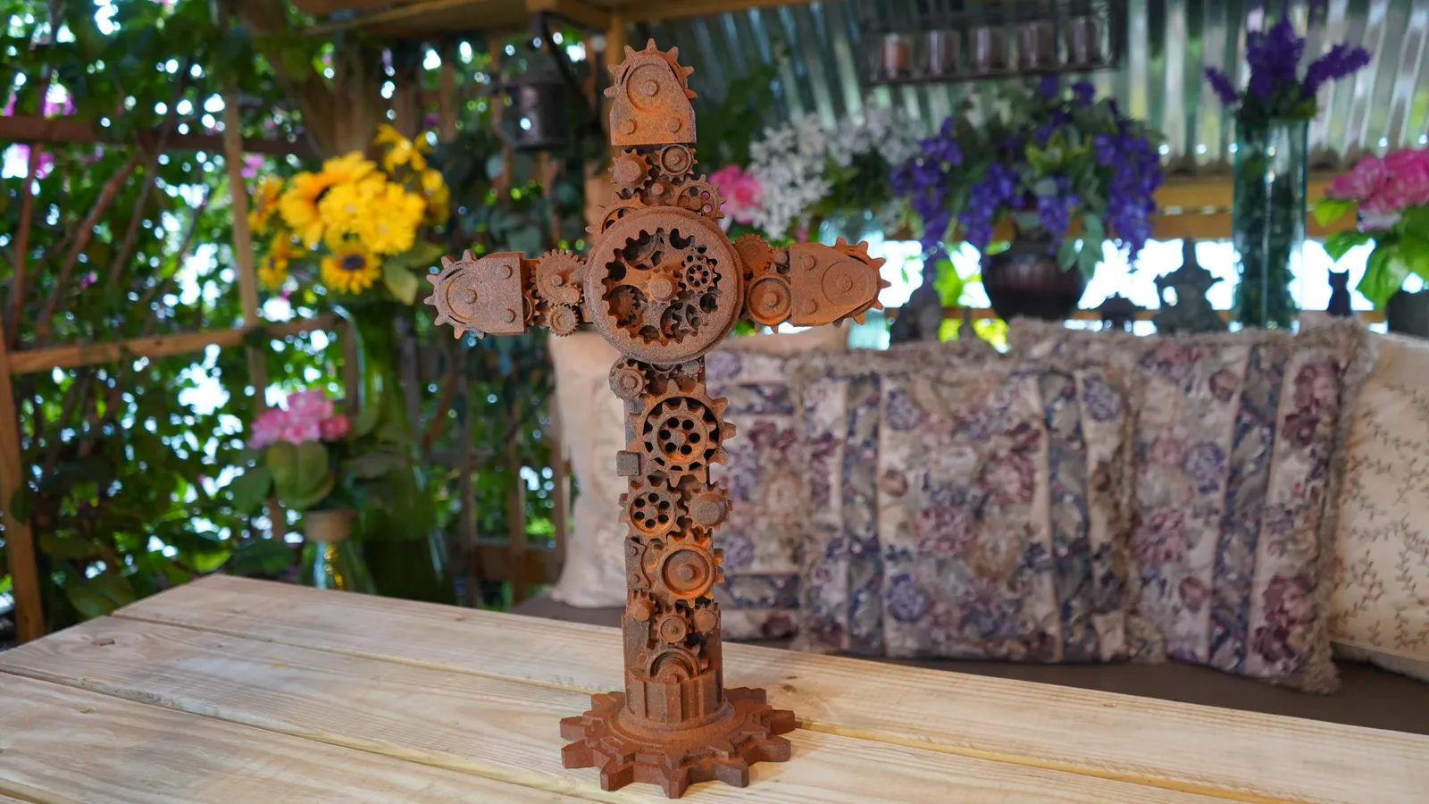 Large rust gear cross